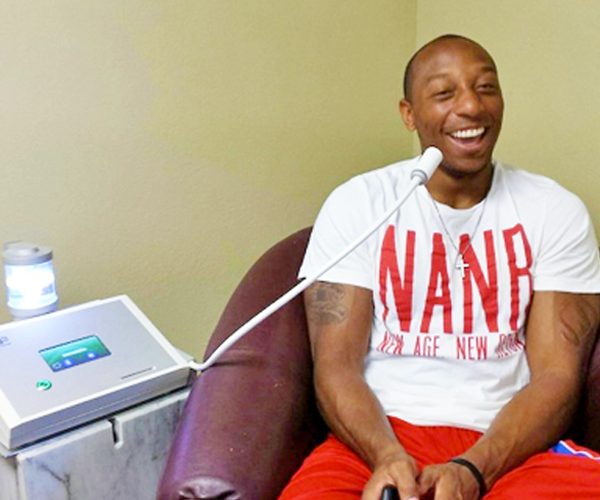 A smiling Chris Harris using the NanoVi