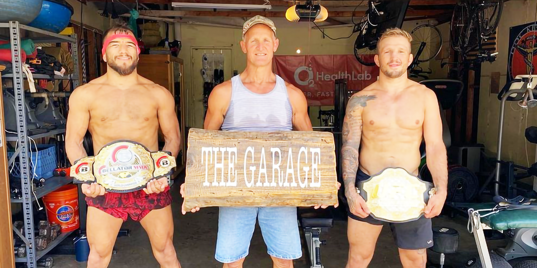 Sam Calavitta with “THE GARAGE” coaches champions Juan Achuleta and T.J. Dillashaw and pays special attention to both their performance and health